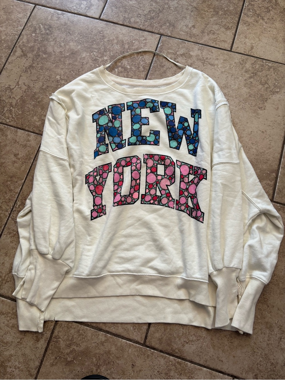 Free People Cream "New York" Graphic Sweatshirt with Blue & Pink Mosaic Letters